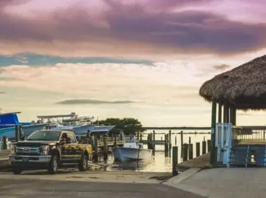 truck pulling boat out of water