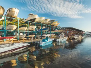 boats stored on racks outside the water