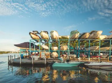 boats stored on racks outside the water