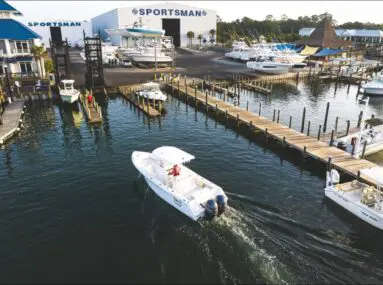 boat pulls in the the dock at safe harbor sportsman