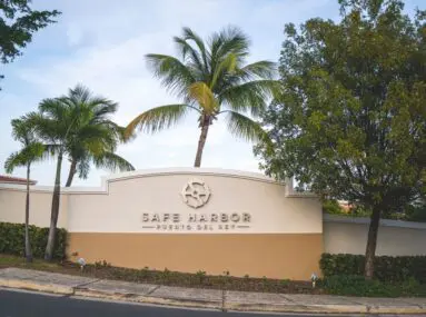 safe harbor puerto del rey entrance with logo