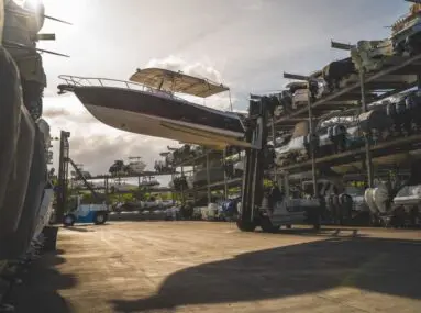 boat being moved on to a rack to be stored