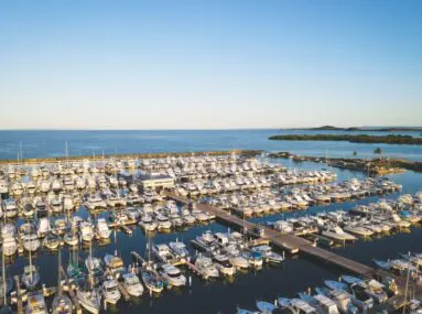 aerial view of safe harbor puerto del rey on a sunny day
