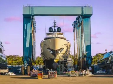 yacht going through maintenance on a dry dock