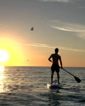 man paddleboarding