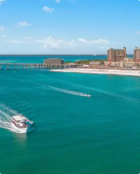 two boats on water with bridge