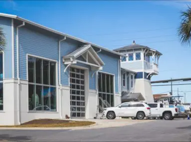 marina building with cars