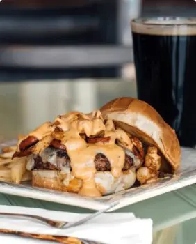 burger smothered in sauce