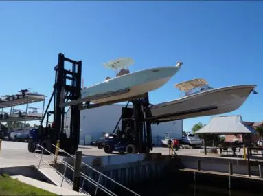 boats being lifted from water