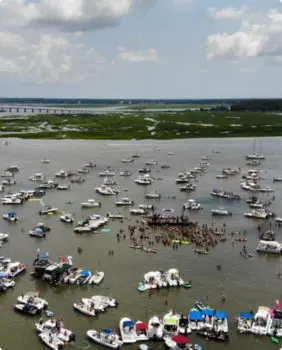 many boats anchored in water
