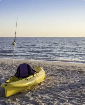 empty kayak on shoreline