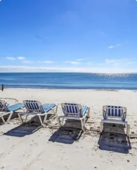 lawn chairs on beach