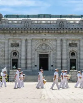 men marching in uniforms