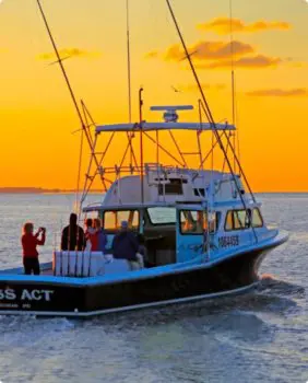 fishing boat and orange sky