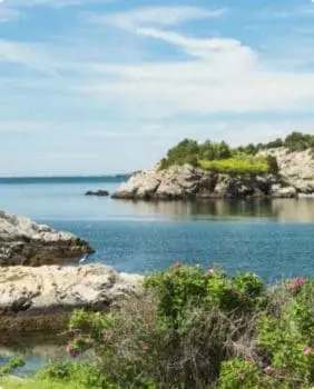 small rocky island in a bay