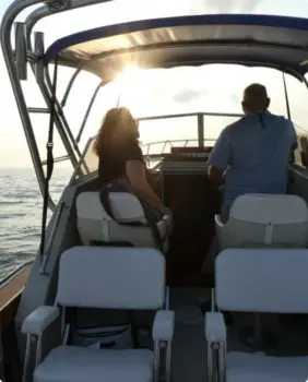 two people on a boat