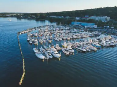 aerial view of safe harbor cowesett with many boats docked