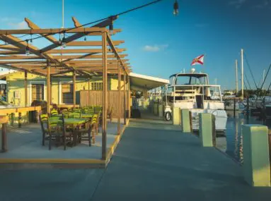 outdoor seating with an arbor at the marina