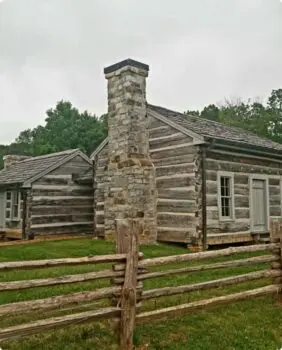 house with a wood fence around it