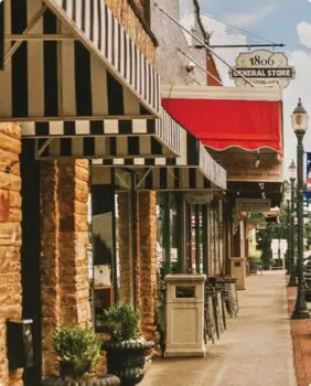 picture of a general store and stripped awnings