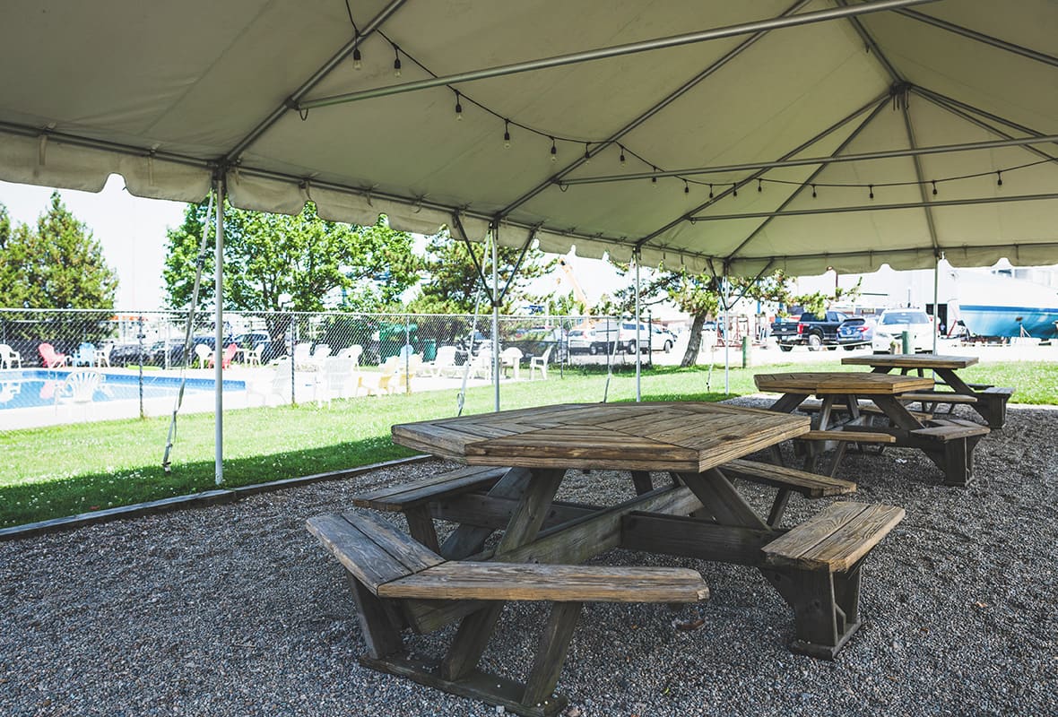 Picnic tables by pool
