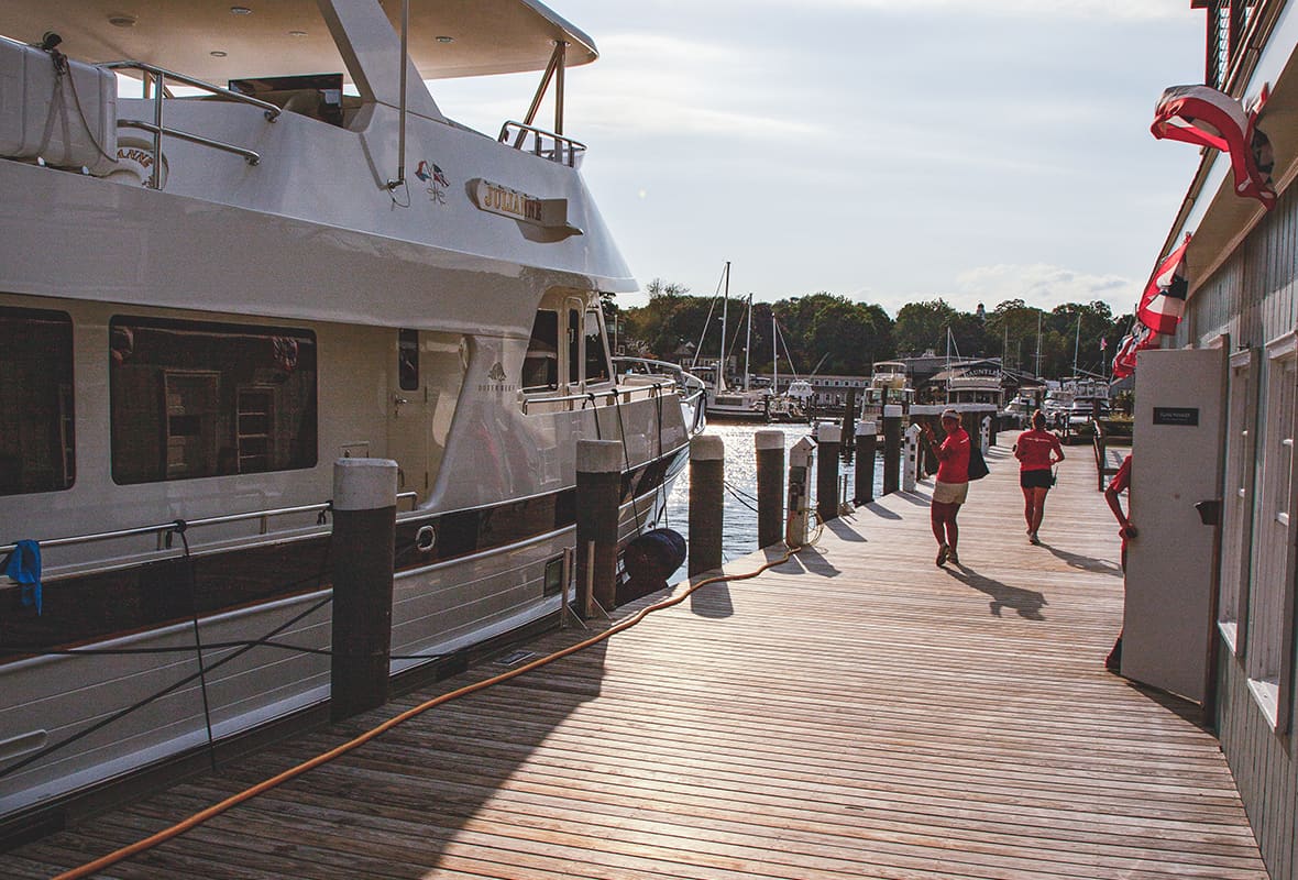 Safe harbor employees walking down dock