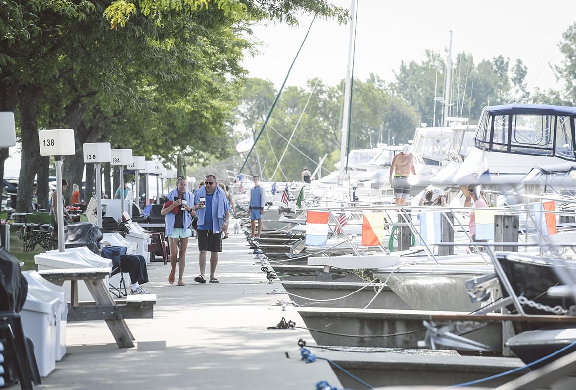 A couple strolling down dock