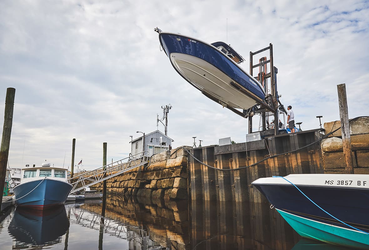 Boat being lifted down to water