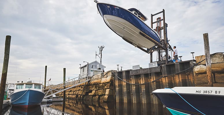 Boats being lifted down from storage
