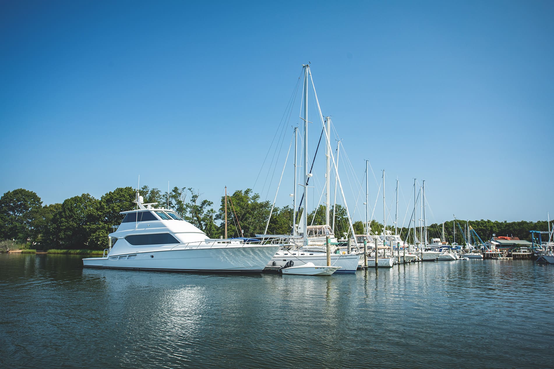 Boats docked at water