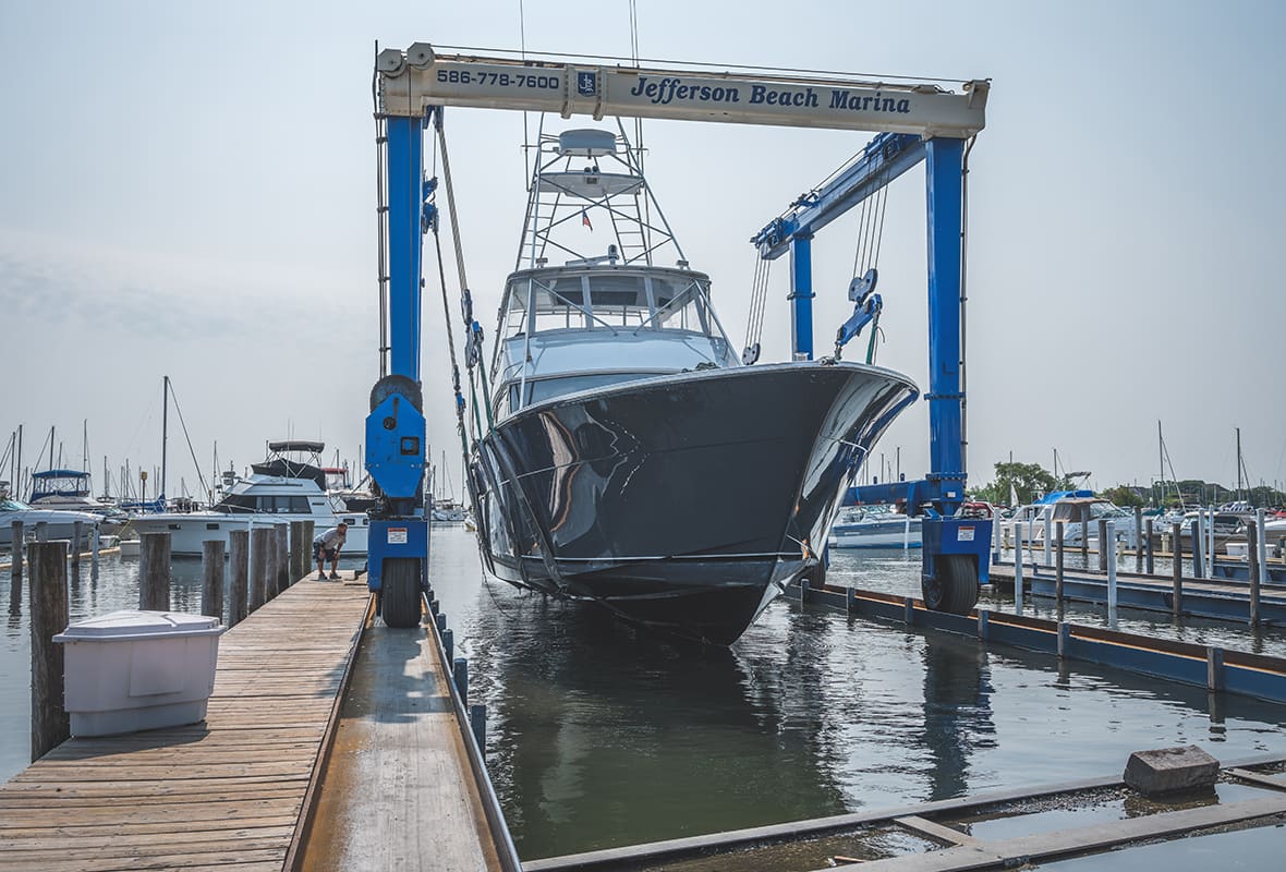 Large boat docked at marina
