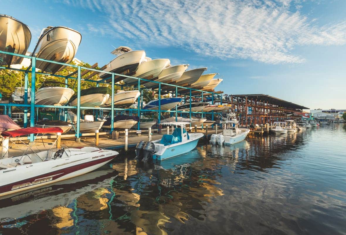 boats stored on racks outside the water