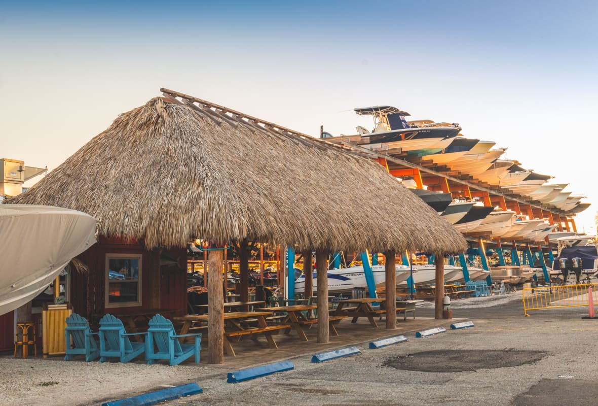 boats stored on racks outside the water