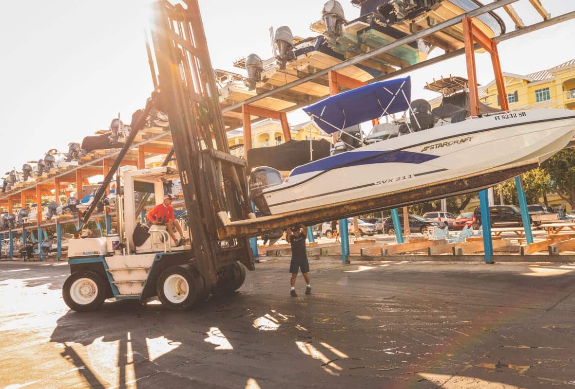 starcraft boat being moved by machinery