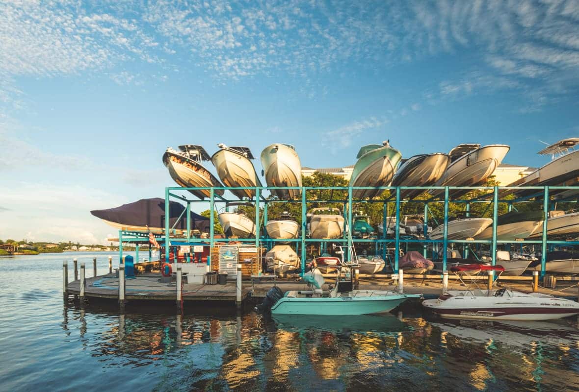 boats stored on racks outside the water