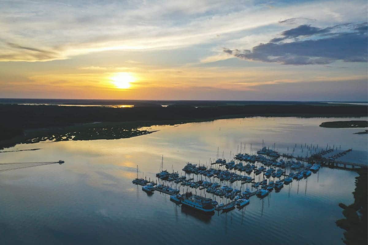 aerial view of skull creek harbor at sunset