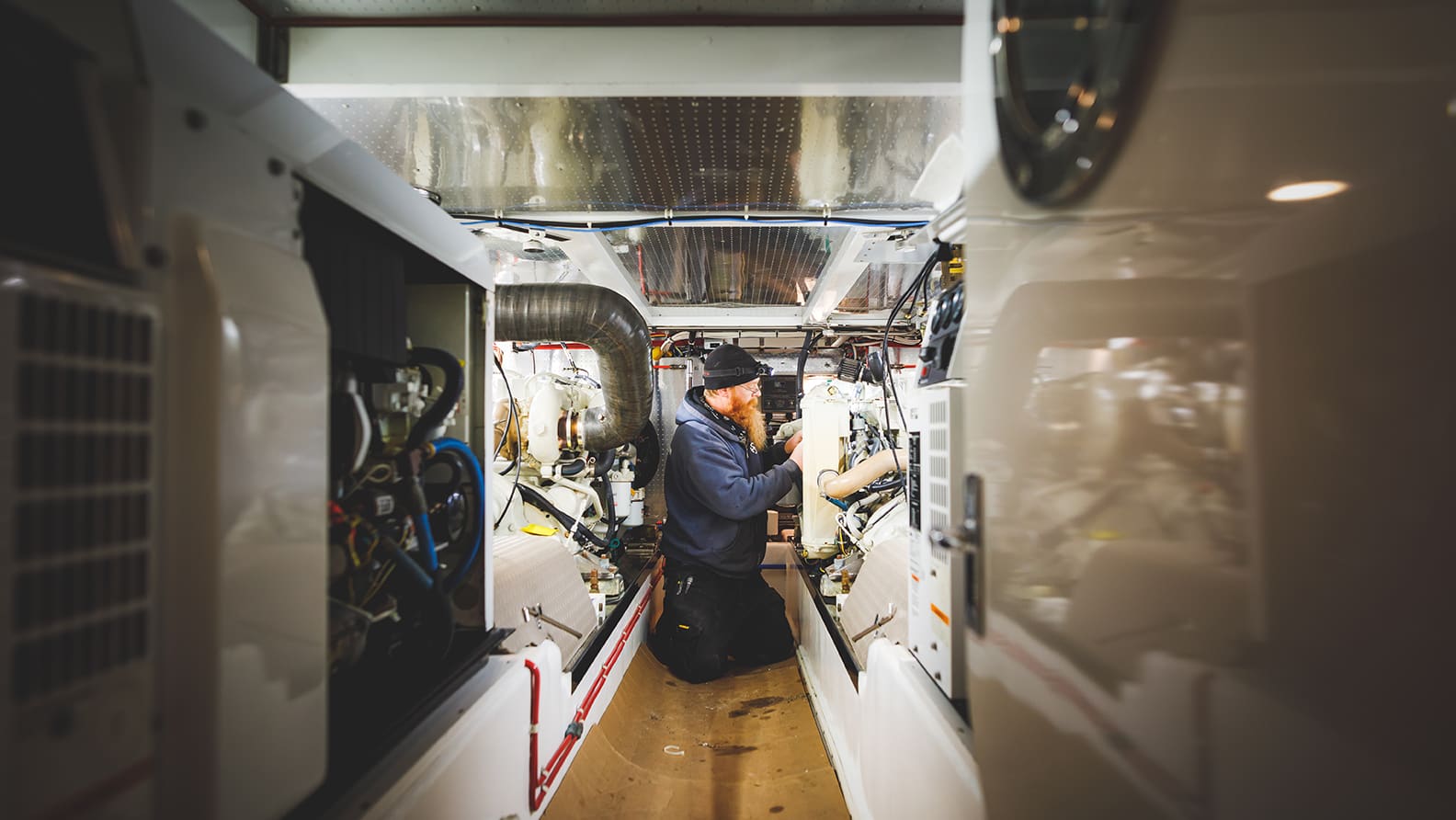 man repairing plumbing