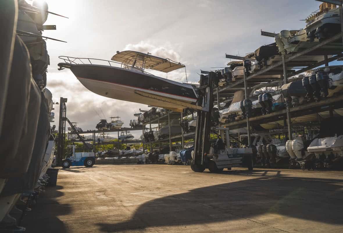 boat being moved on to a rack to be stored