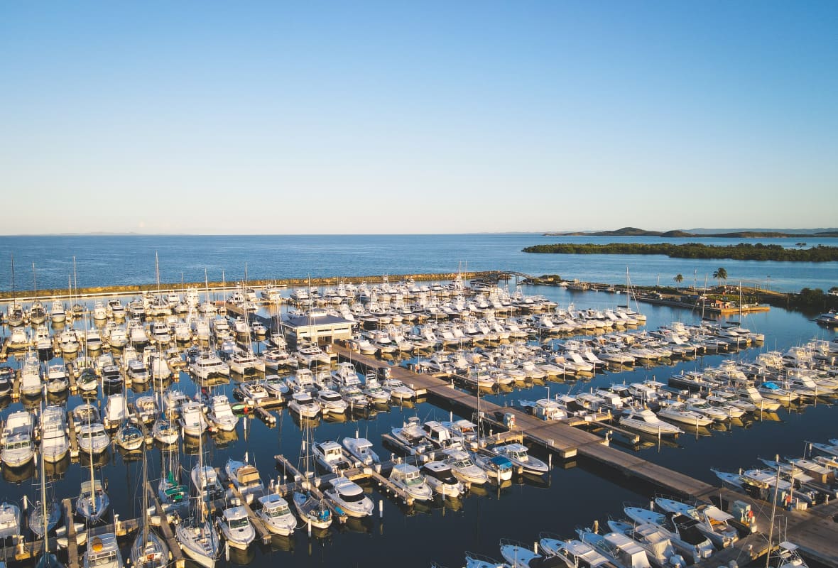 aerial view of safe harbor puerto del rey on a sunny day