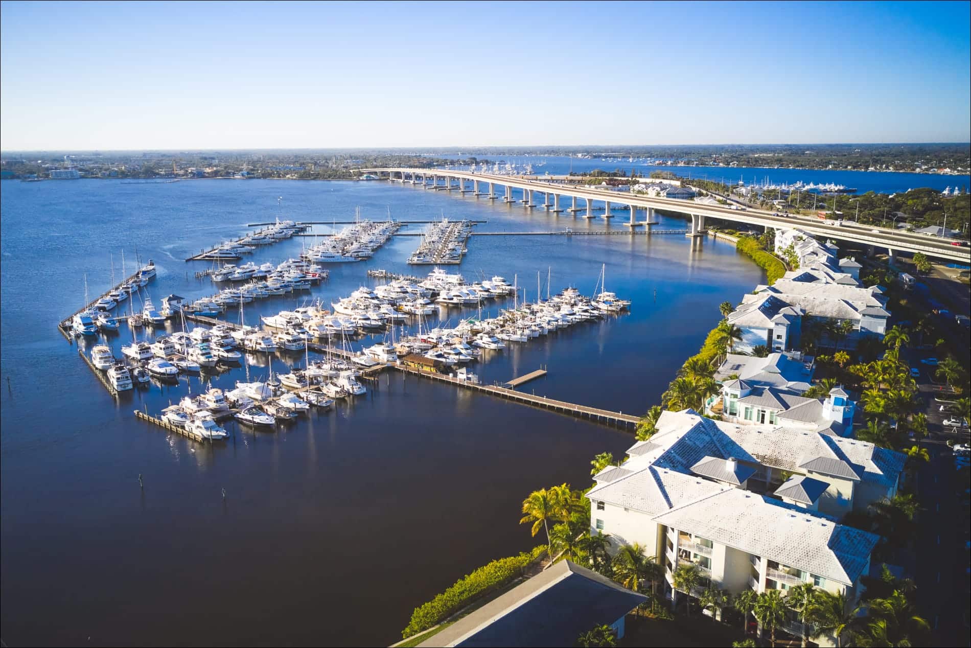 marina on the water with bridge