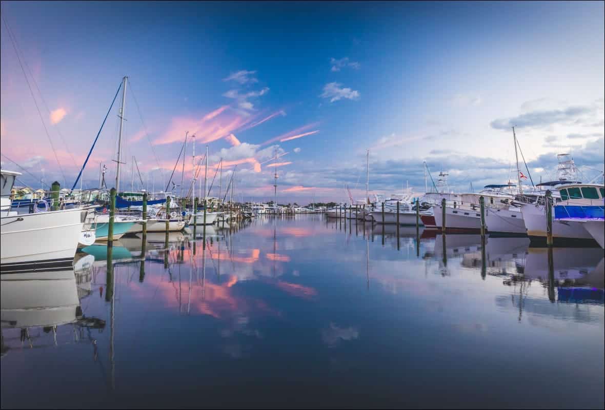 calm water with boats docked