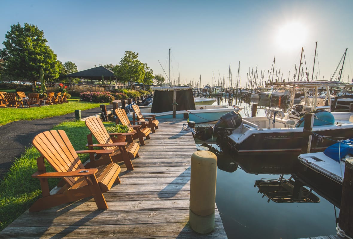 brown chairs on a dock