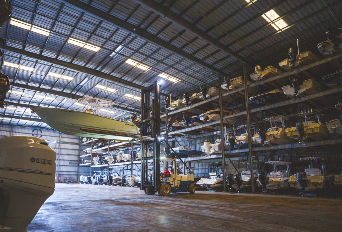 boat being moved in a hanger to be stored
