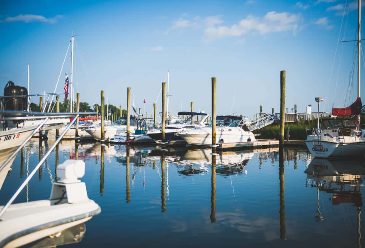 On the water shop with boats in slips