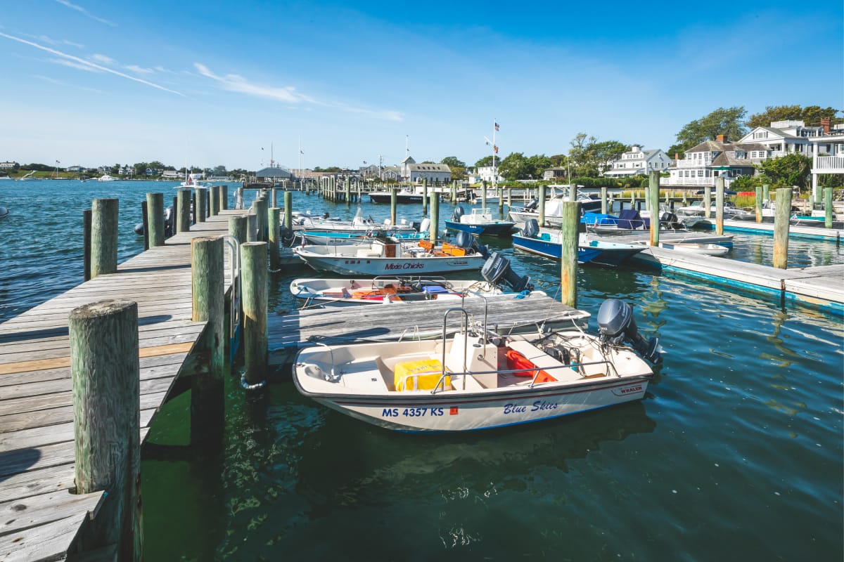 Small fishing boats docked at marina
