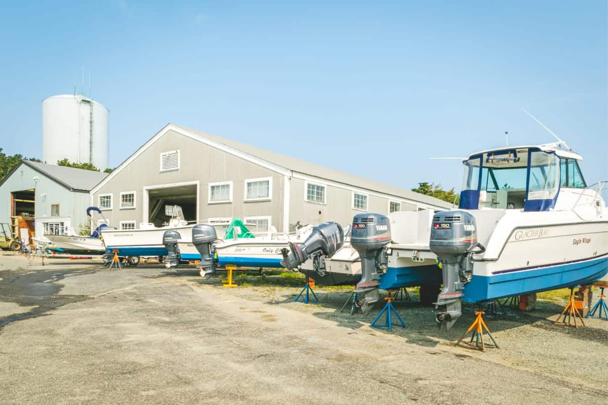 Boats on land outside of marina facility
