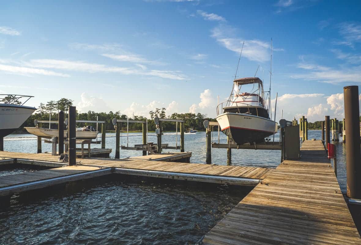 Dock with boats hoisted out of the water