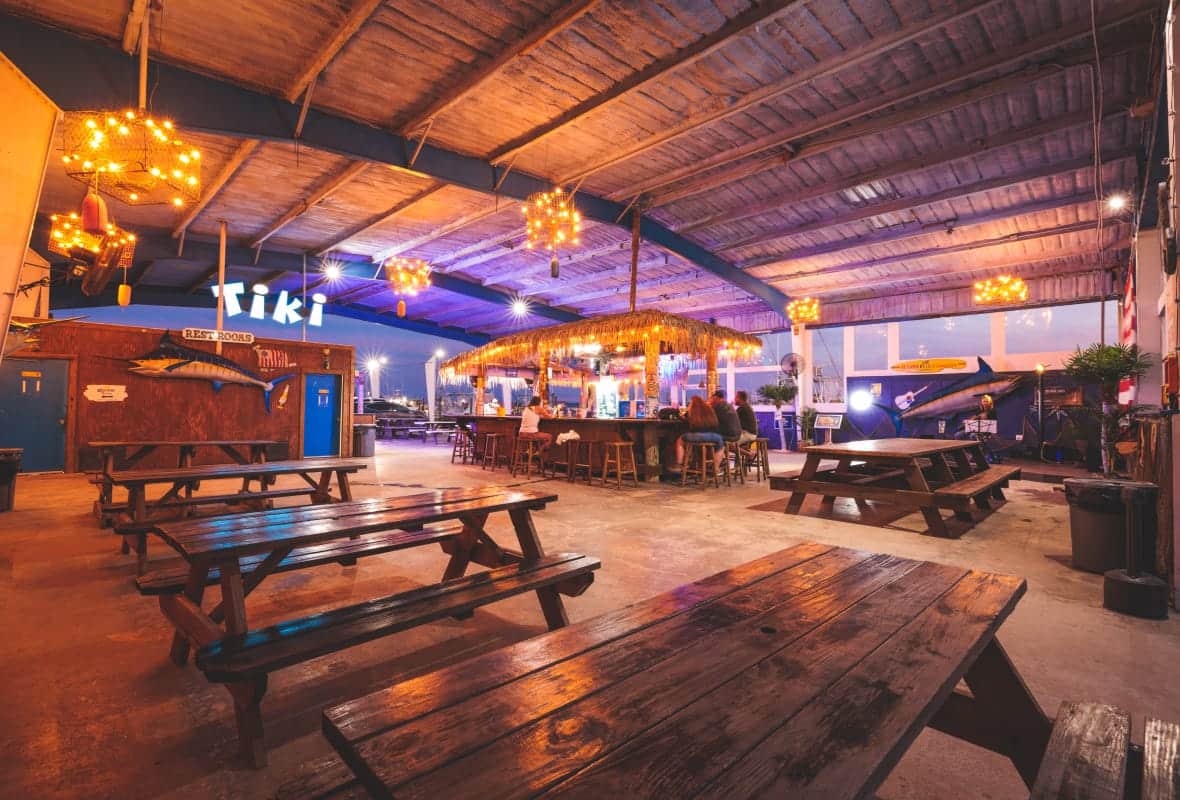tiki bar with picnic tables