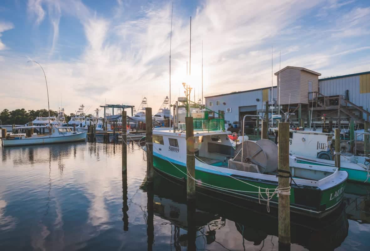 fishing boat docked at marina