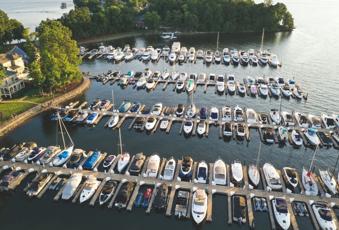 rows of boats docked at slips